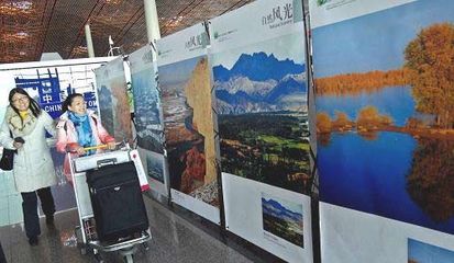 新疆和田旅游风光展在首都航站楼开幕(图)